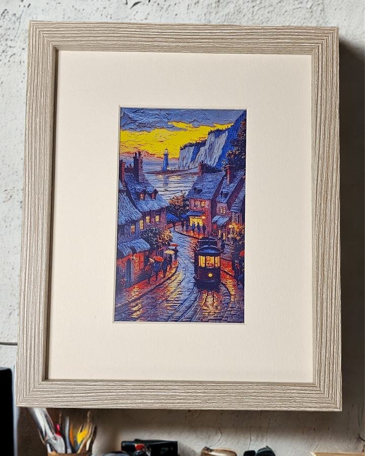 CanvasBT frame with a coastal town print